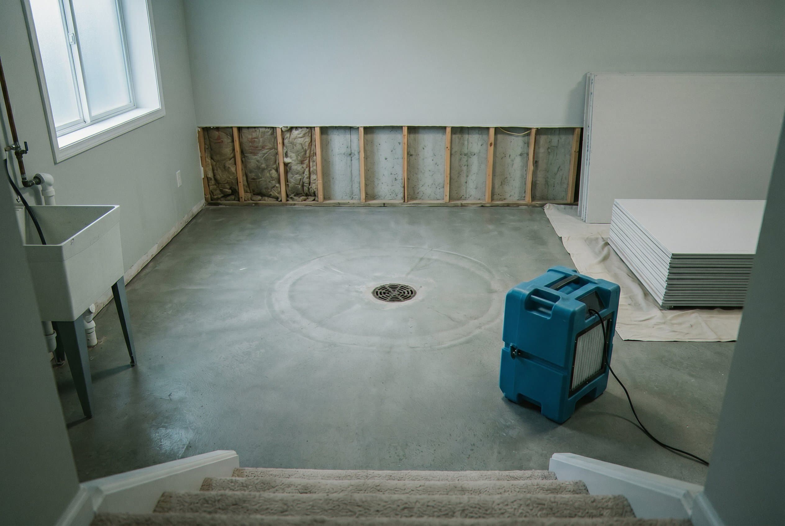 Clean disinfected basement floor after remediation