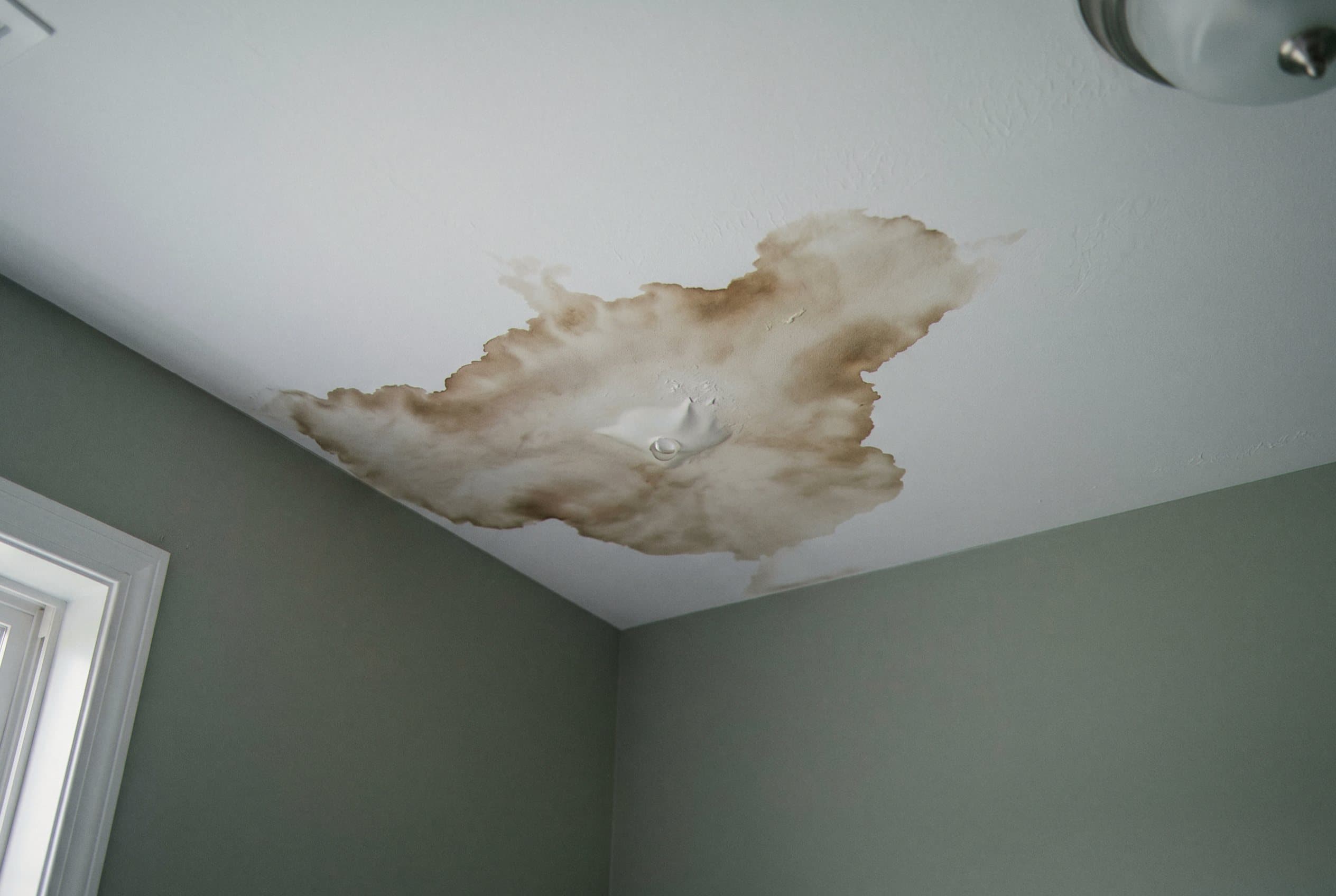 Drywall wet staining from hidden water leak